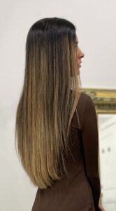 The colour is low-baby lights with natural Remy Indian and Asian blonde human hair extensions 22" long. 